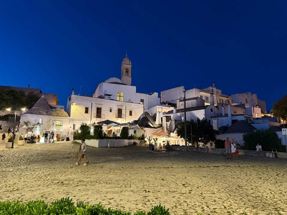Beautiful Italian architecture lit up at night. 